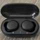 The WF-XB700s’ charging case feels cheap, but its flat bottom design means it can be placed on a desk while still providing easy access to the earbuds.